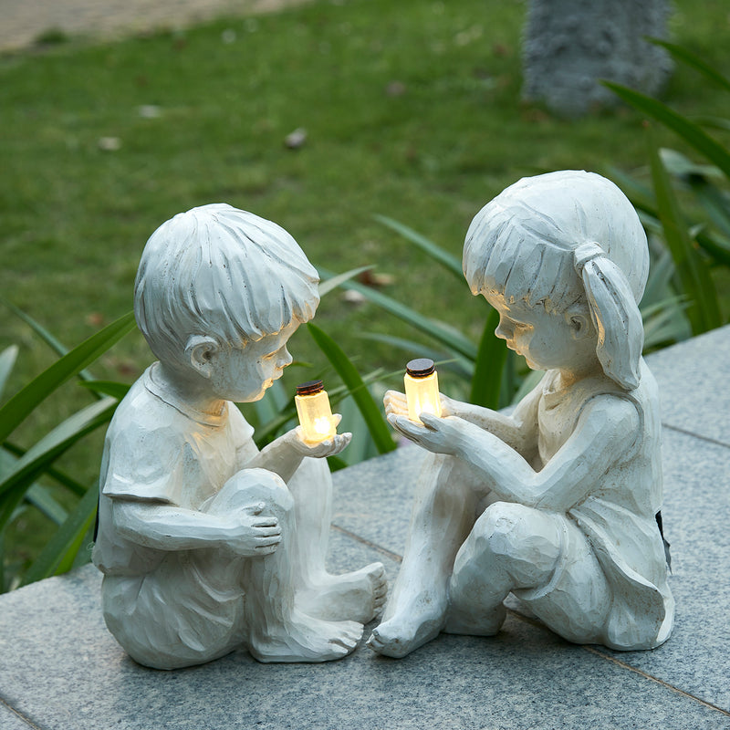 Garden Children Statues Light Up Firefly Jar Solar Powered | Set of 2 | Boy and Girl Couple Sitting, Glimpse of God, Yard Art Décor, Indoor & Outdoor Ornament Gifts for Lawn, Patio, 7.5" W x11.8”H